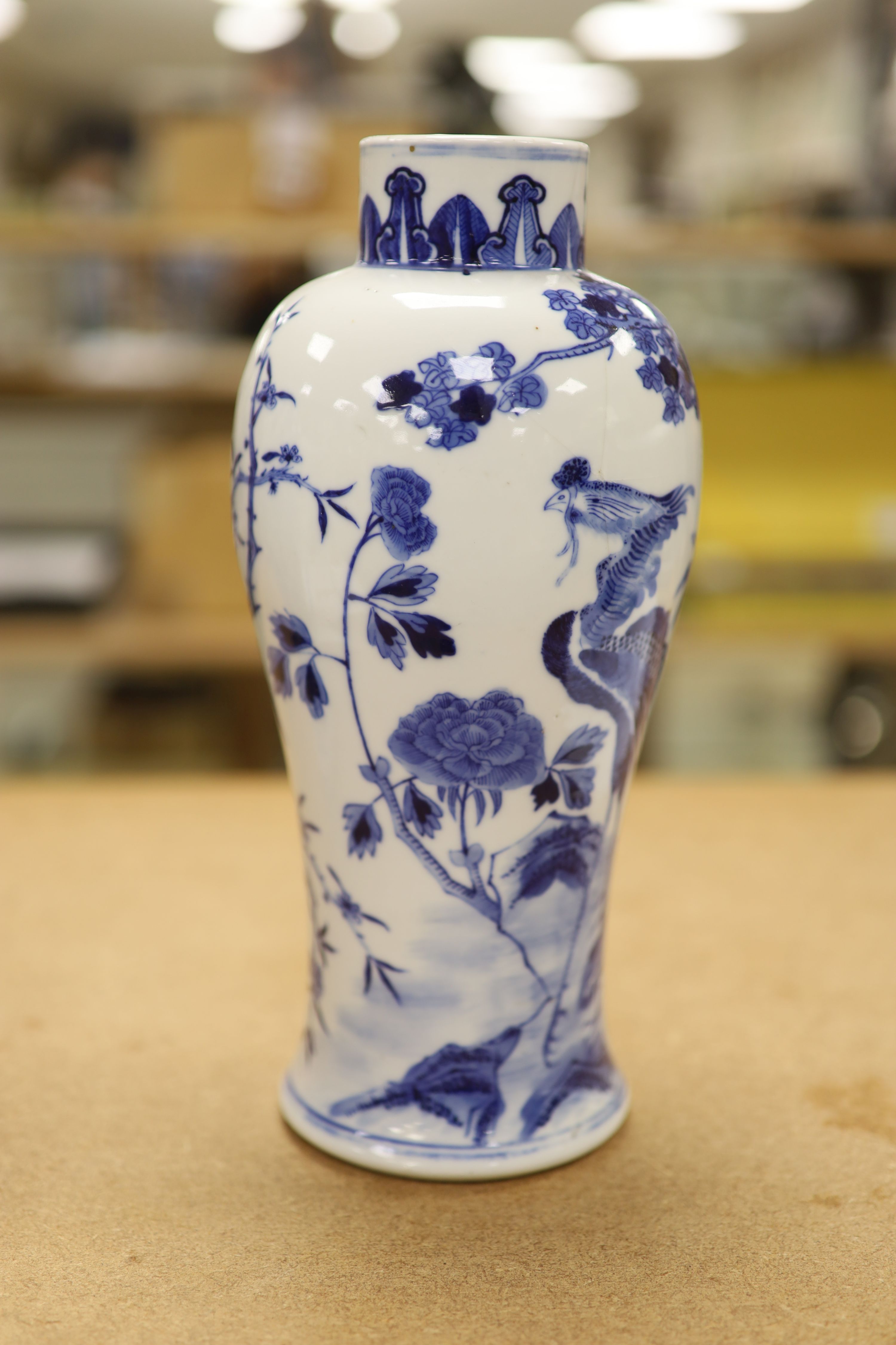 Two 19th century Chinese blue and white vases, decorated with phoenix, tallest 28cm (a.f)